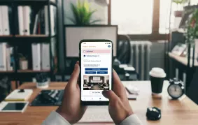 Principal holding phone EPIC APP